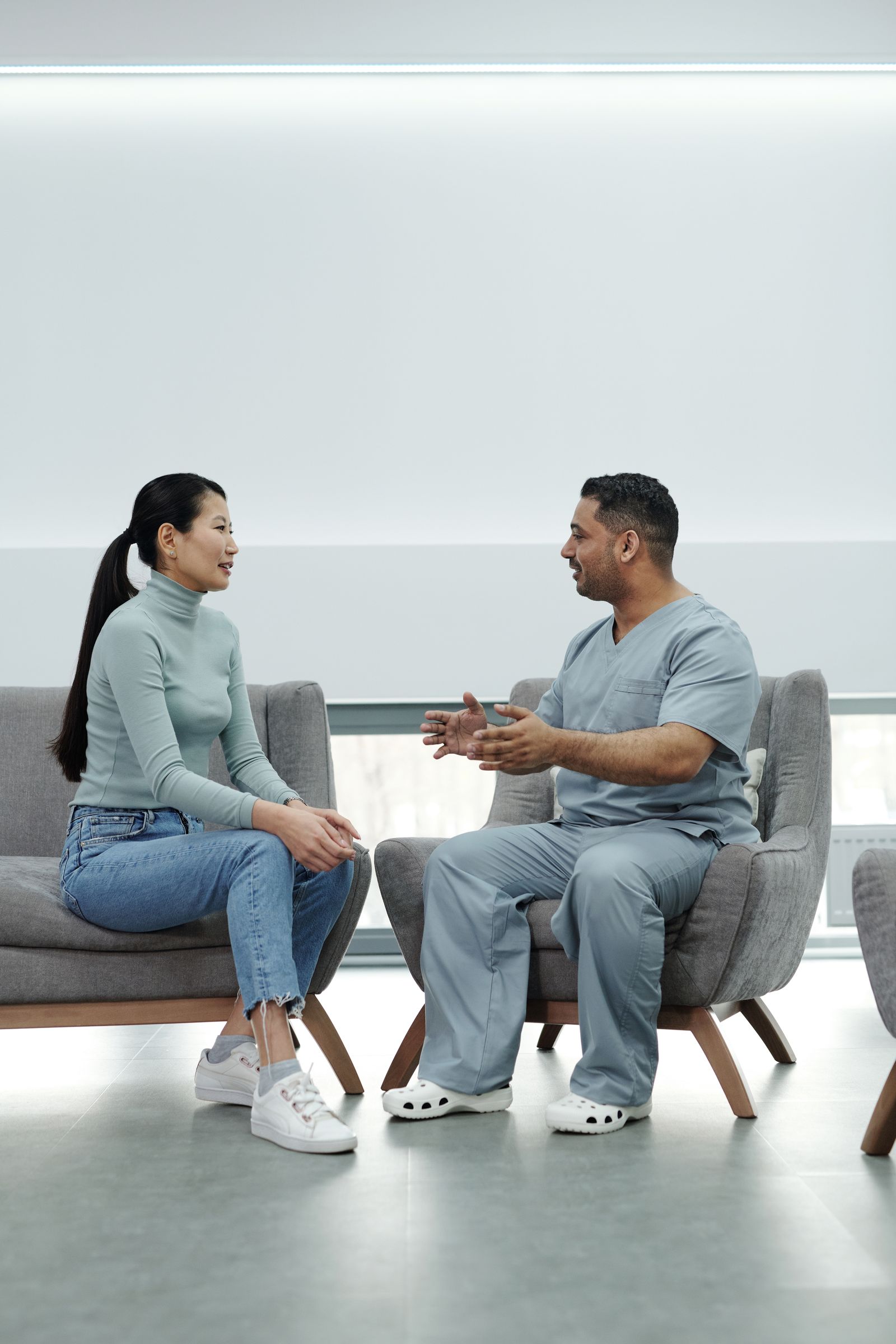 A patient and a clinician talking together during a calm consultation at Calm Clinic
