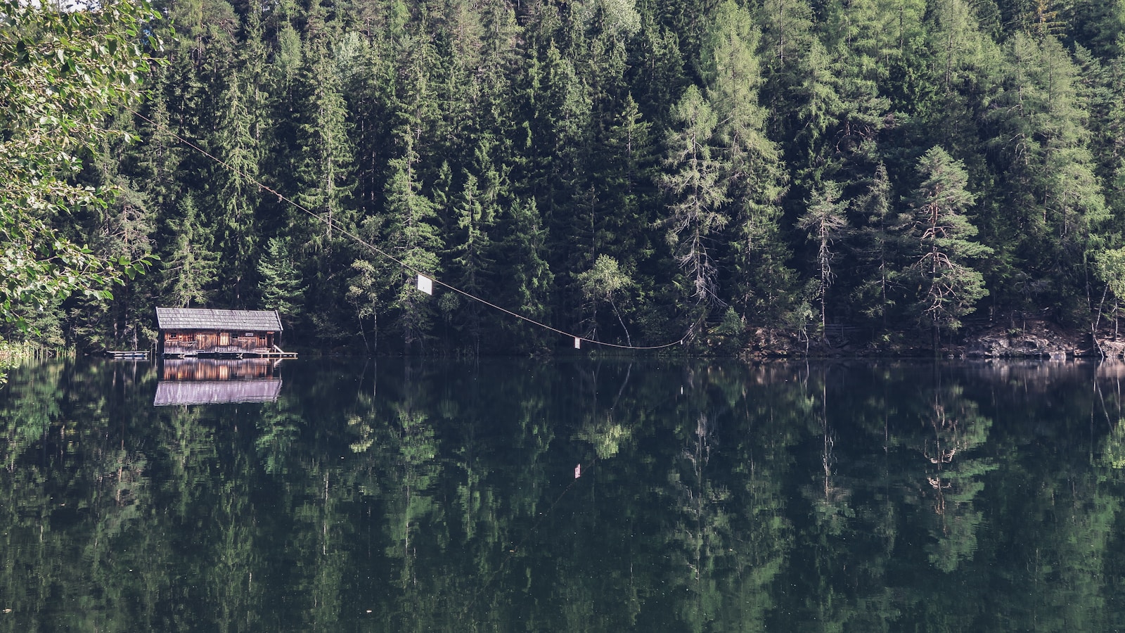 A-frame cabin beside the lake